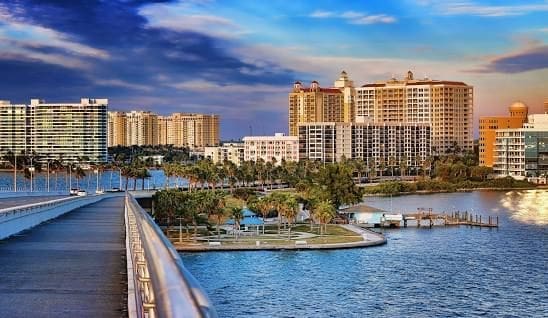 Pedestrian bridge leading to waterfront high-rises